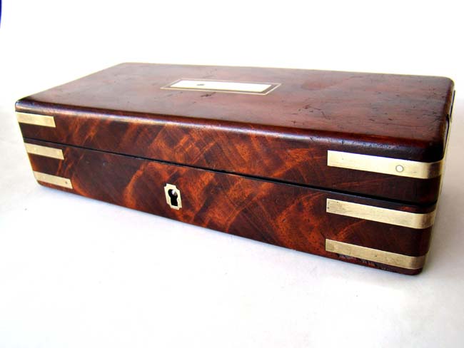 A fine cased set of seven straight edge razors with ivory and bone handles in a brass bound walnut box circa 1850 — image 2